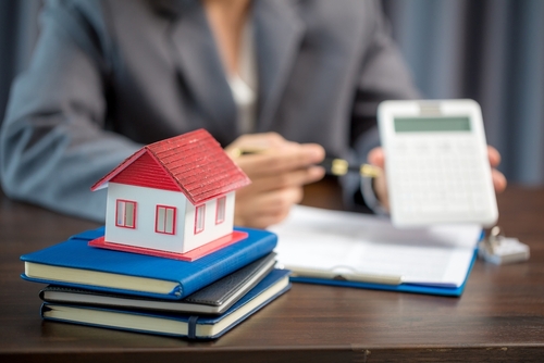 Woman,Home,Sales,Person,Is,Checking,Documents,For,House,Purchase