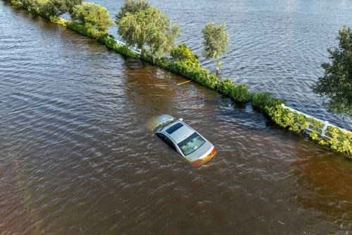 Flooded,Florida,Street,With,Stuck,Car,After,Hurricane,Debby,Rainfall
