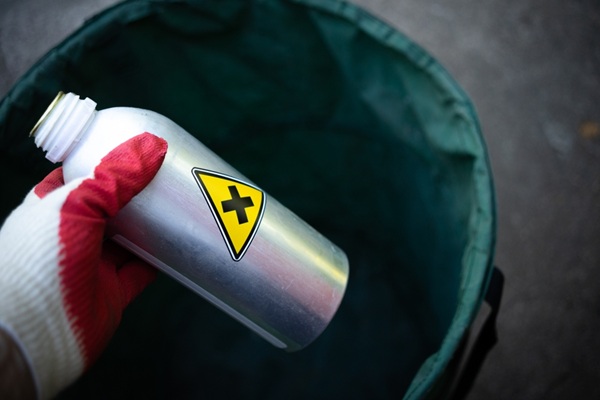 A,Black,Cross,In,A,Yellow,Triangle.disposal,Of,Harmful,Waste.