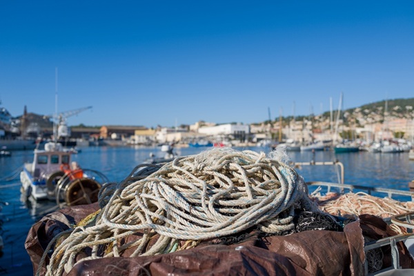 Close-up,Of,Coiled,Fishing,Ropes,And,Nets,Resting,On,A