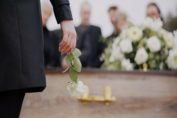 Death,,Funeral,And,Hand,Of,Man,With,Flower,At,Coffin,