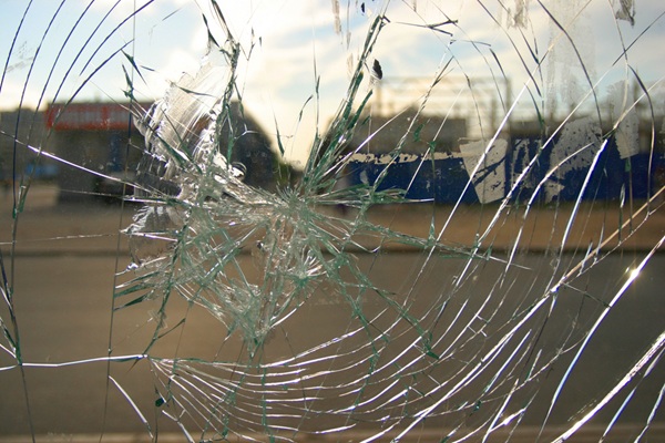 Street,View,Throw,Window,With,Broken,Glass