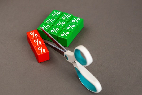 Interest,Rate,Cuts.,Reducing,Interest,Rates.,Business,Concept.,Scissors,Cutting